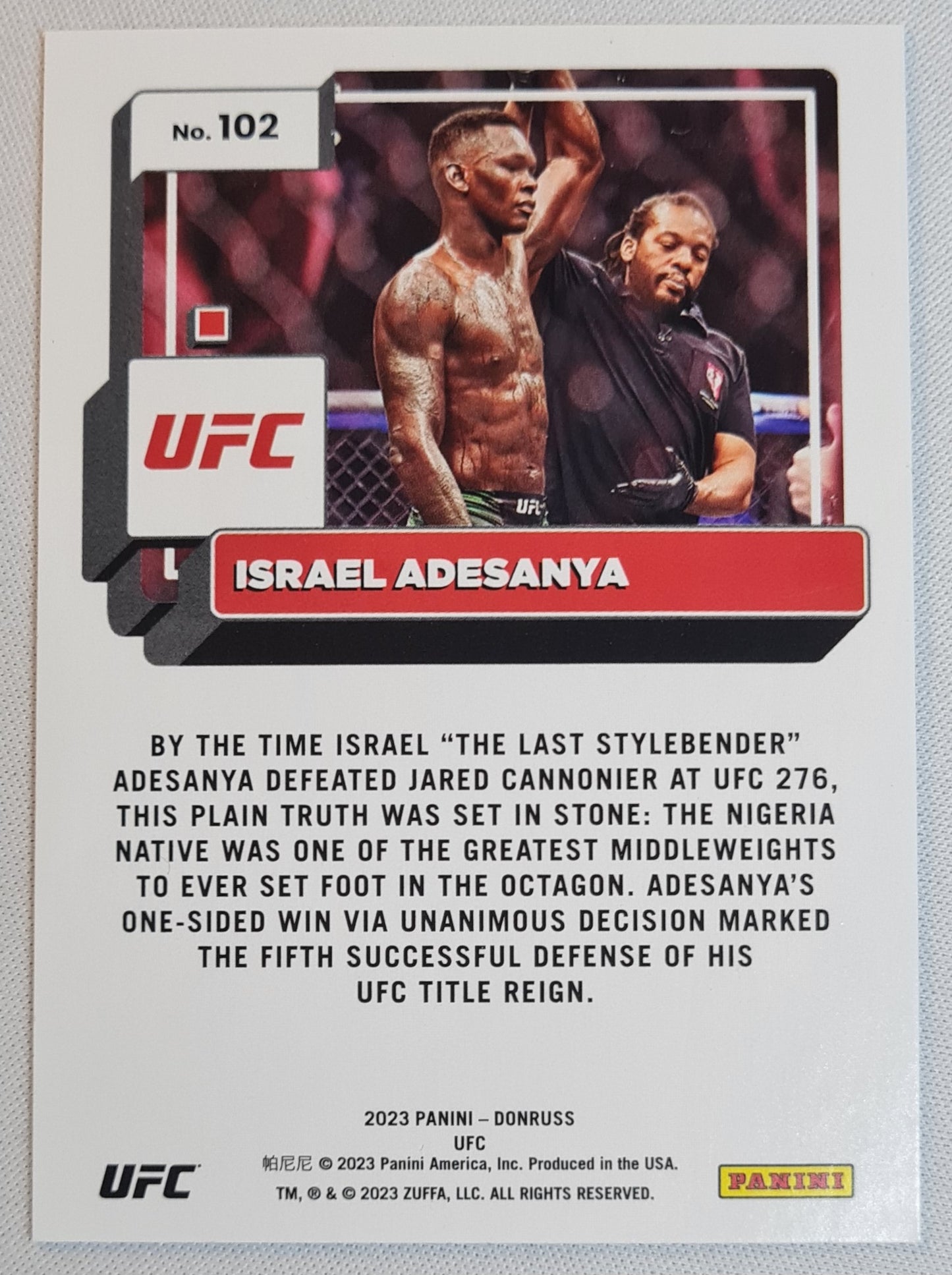 Israel Adesanya - 2023 Panini Donruss Orange Laser #102 UFC SP