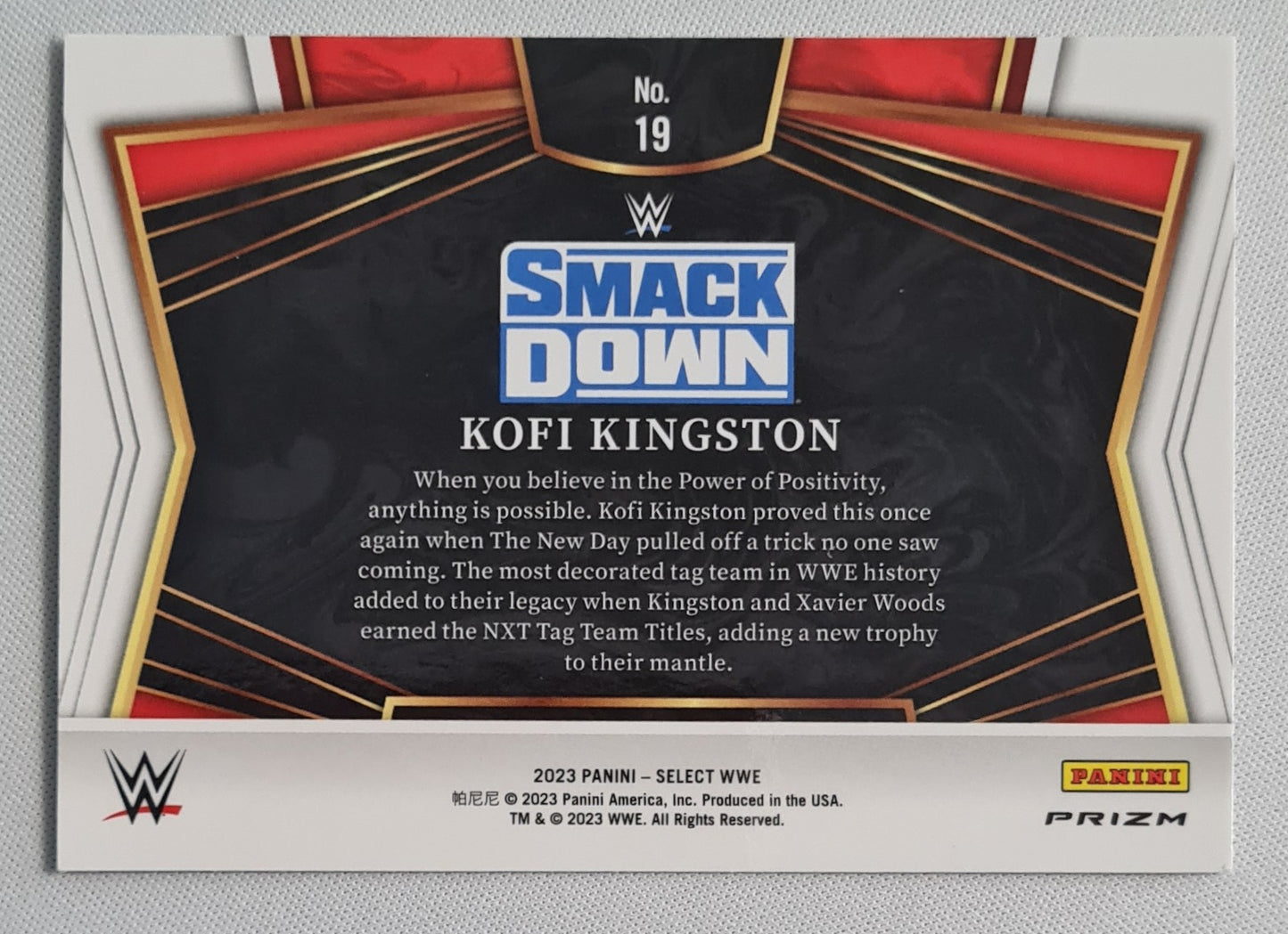 Kofi Kingston - 2023 Panini Select WWE #19 SMACK DOWN Sensations Flash Prizm