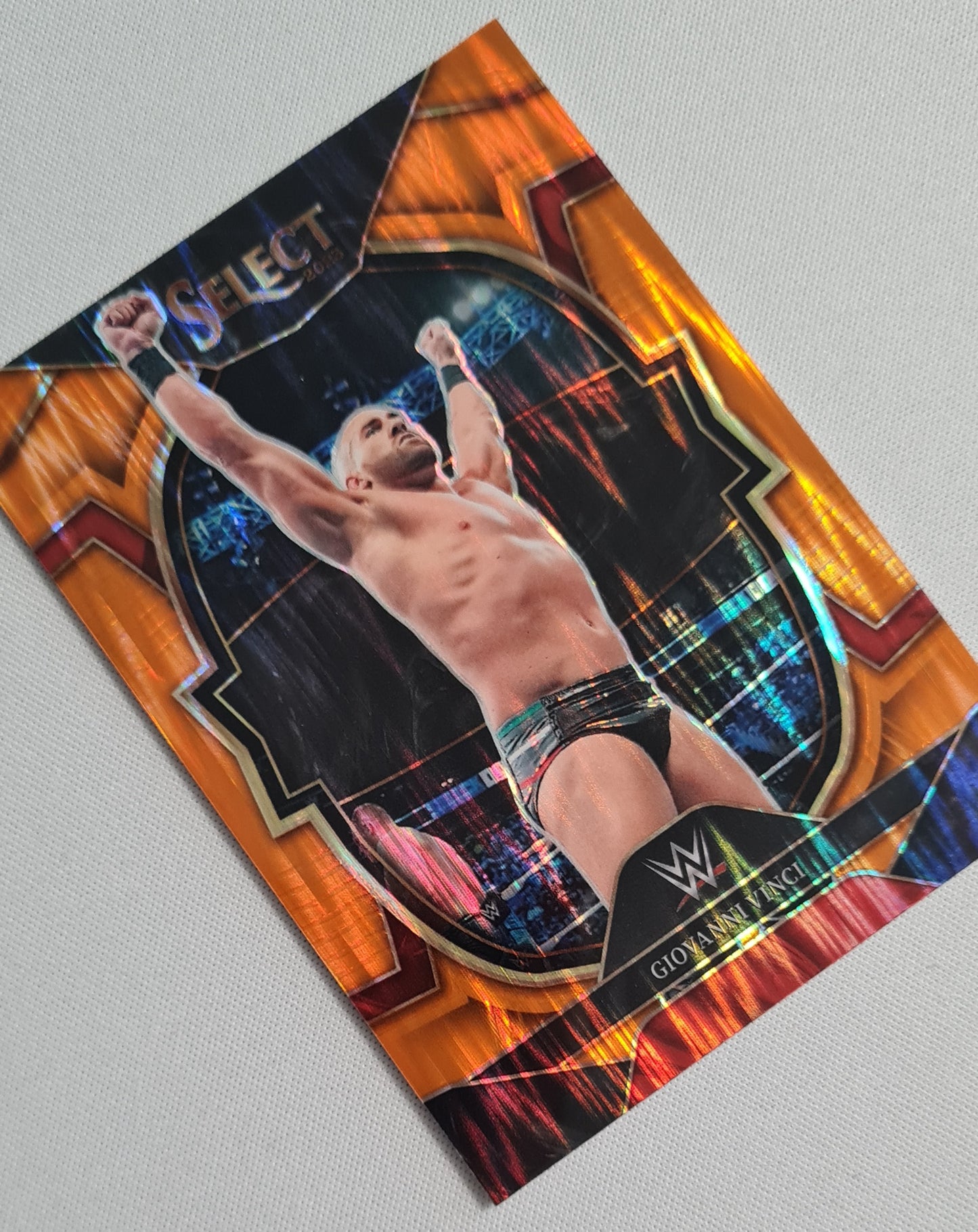 Giovanni Vinci - 2023 Panini Select WWE #42 SMACK DOWN Orange Sensations Prizm