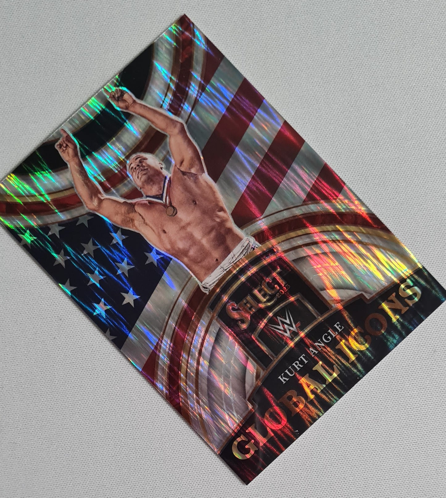 Kurt Angle - 2023 Panini Select WWE Wrestling Prizm #23 Global Icon Silver Flash HOF