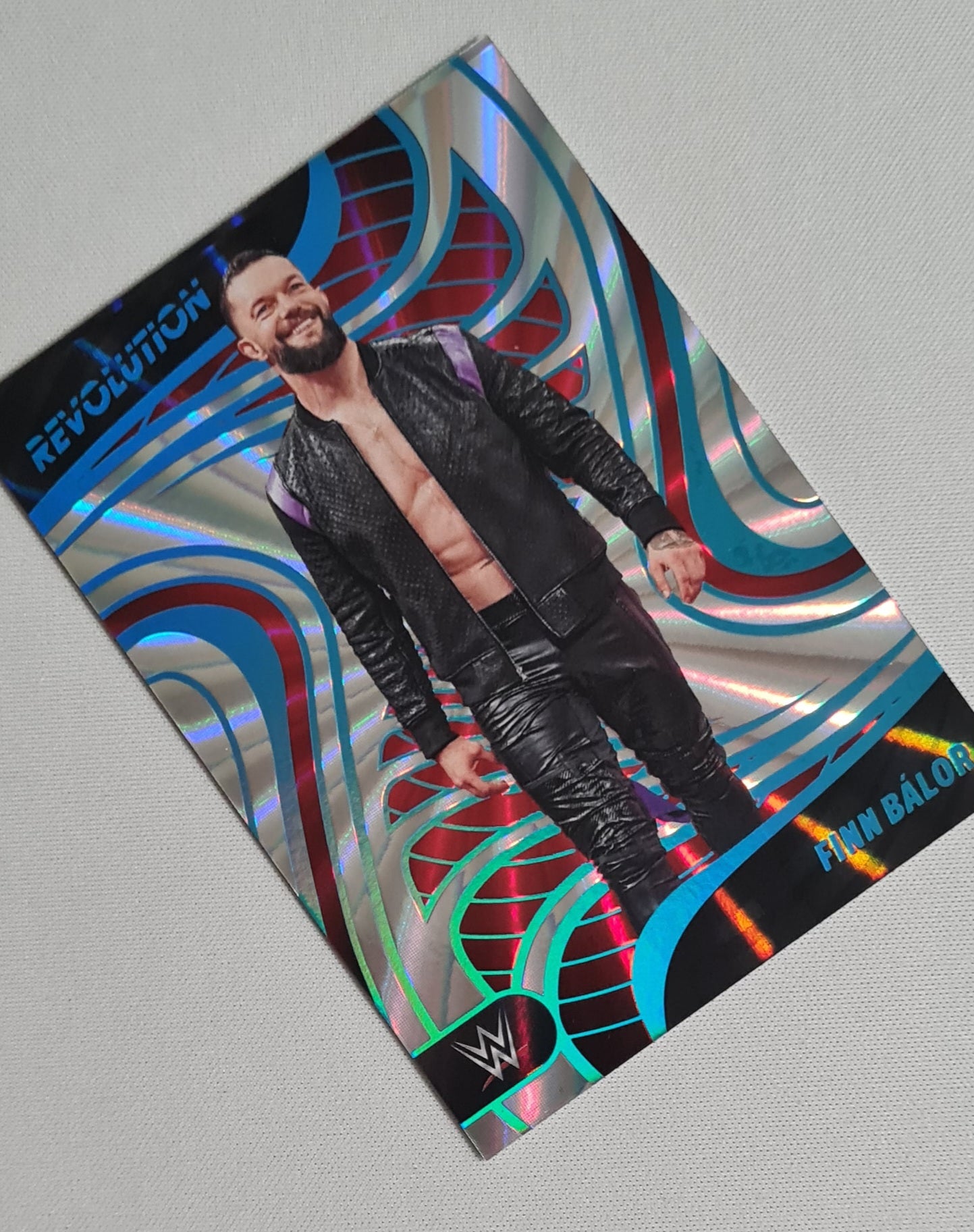 Finn Balor - 2023 Panini Revolution WWE RAW #73 /99