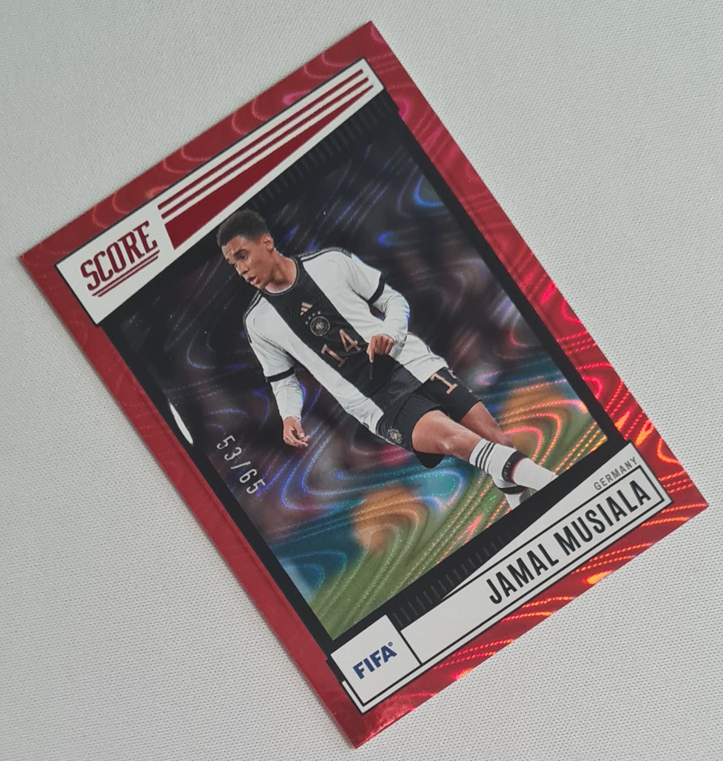 Jamal Musiala - 2022/23 Panini Score FIFA Soccer National Team Germany #84 Red Swirl /65