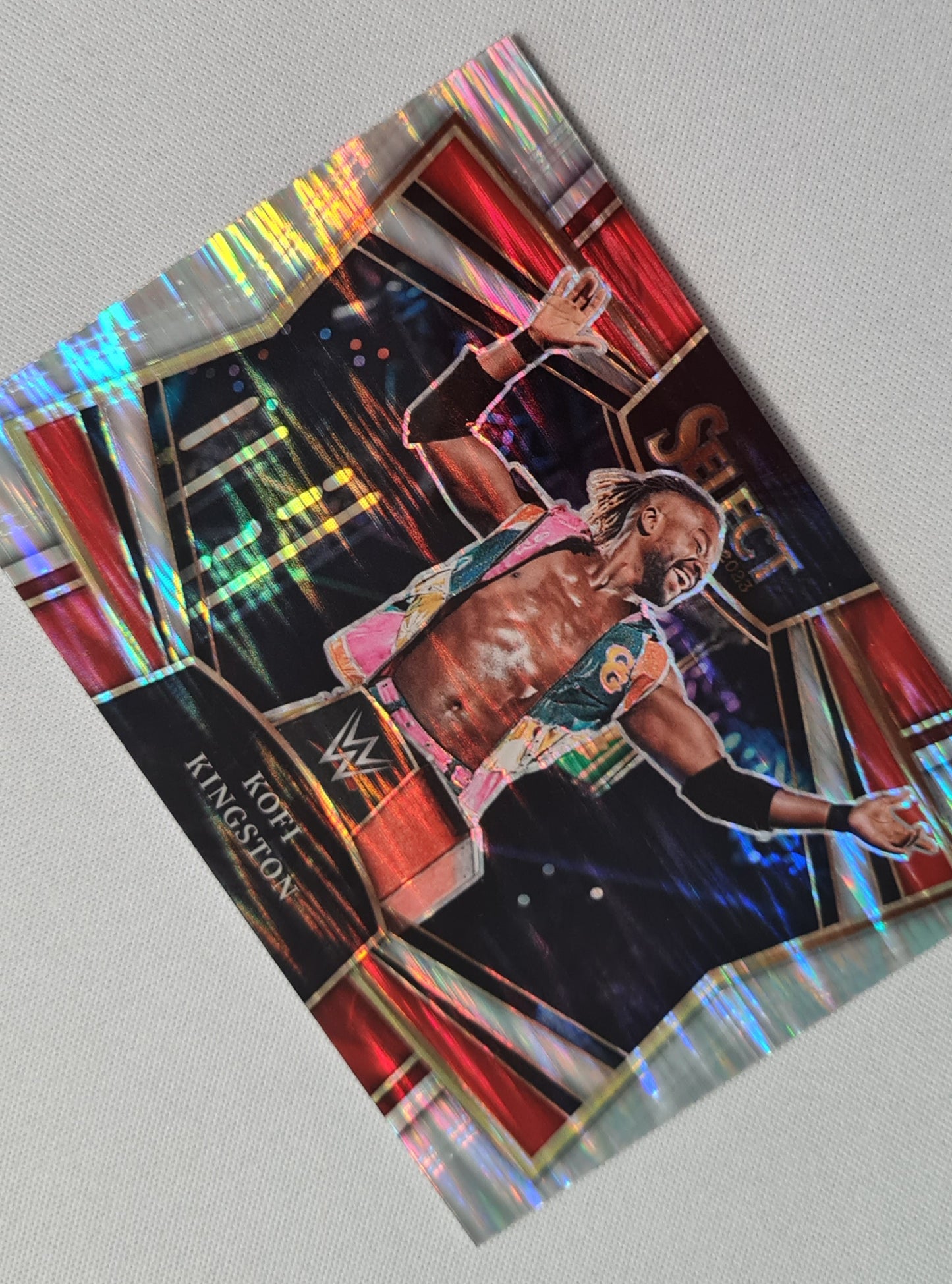 Kofi Kingston - 2023 Panini Select WWE #19 SMACK DOWN Sensations Flash Prizm