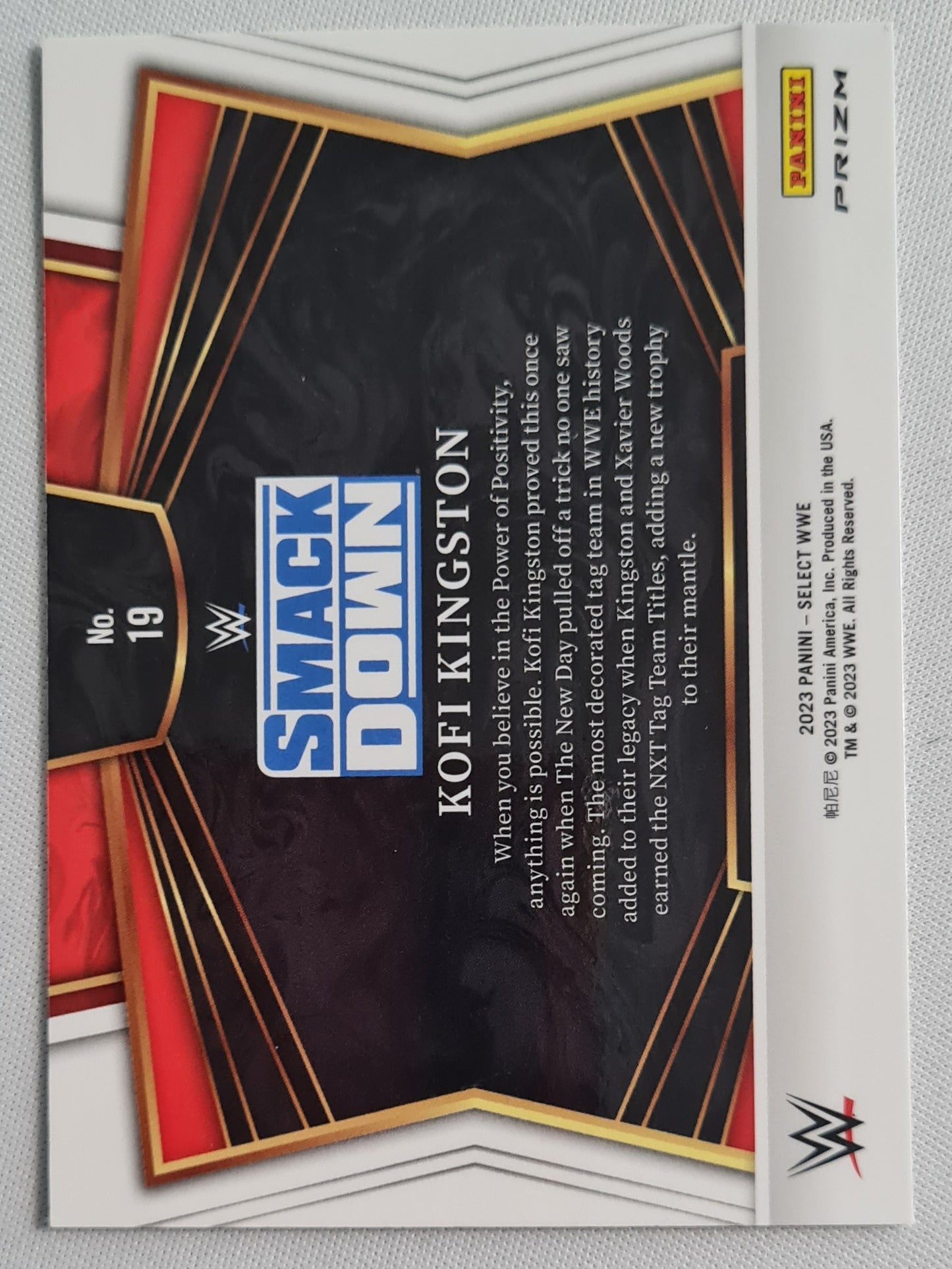 Kofi Kingston - 2023 Panini Select WWE #19 SMACK DOWN Sensations Flash Prizm