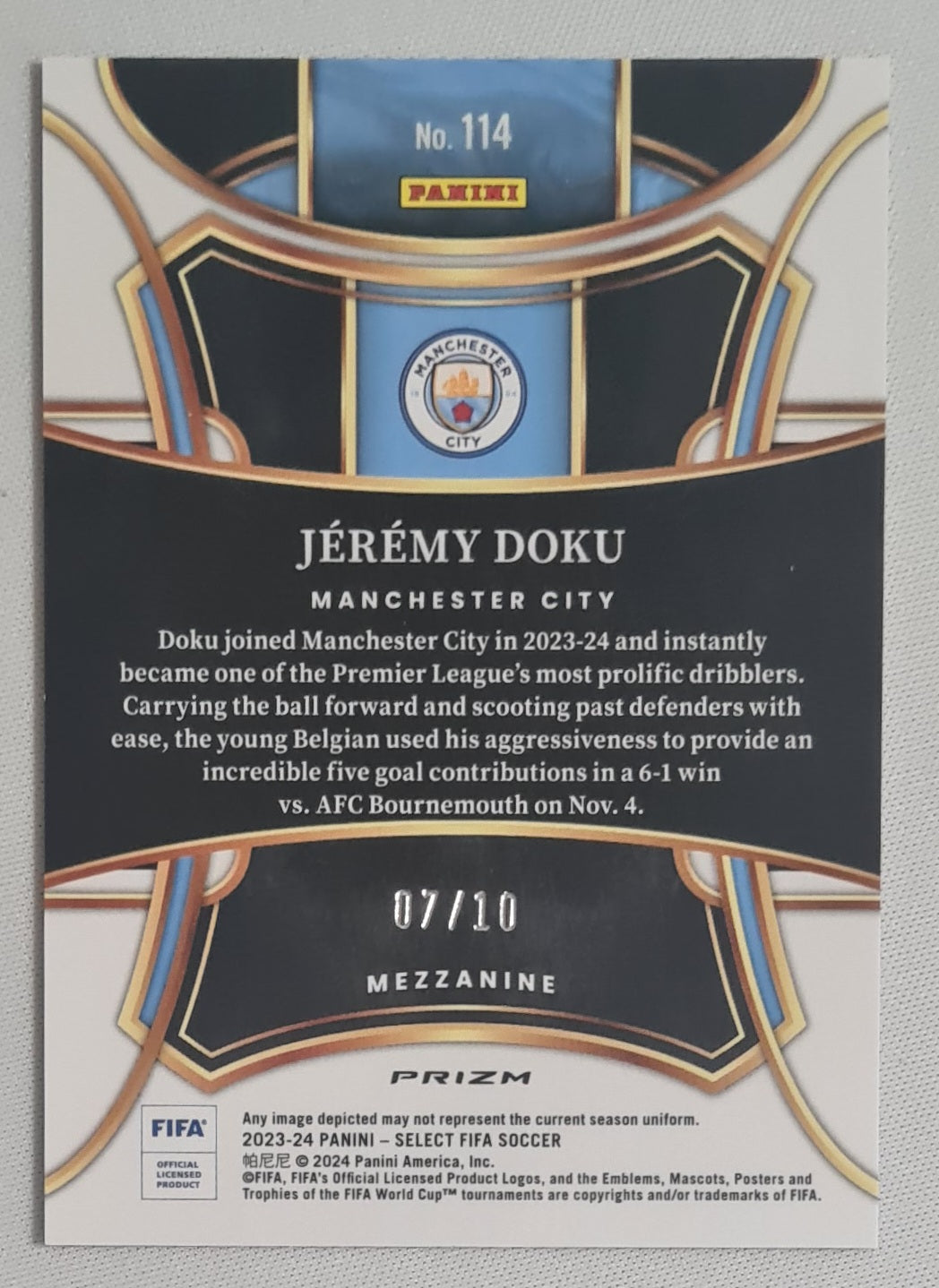 Jeremy Doku - 2023/24 Panini Select FIFA Soccer Prizm Man City #114 Mezzanine Gold Wave/10