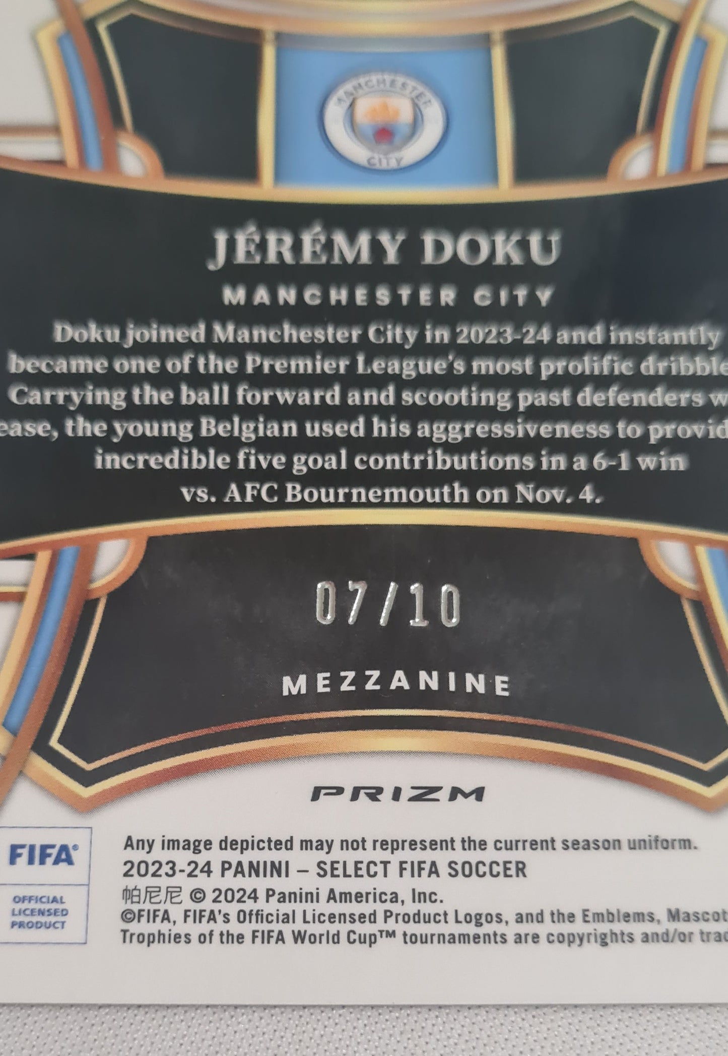 Jeremy Doku - 2023/24 Panini Select FIFA Soccer Prizm Man City #114 Mezzanine Gold Wave/10