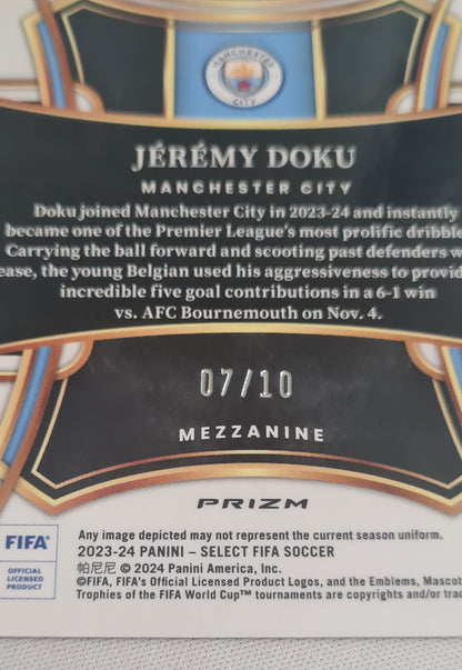 Jeremy Doku - 2023/24 Panini Select FIFA Soccer Prizm Man City #114 Mezzanine Gold Wave/10