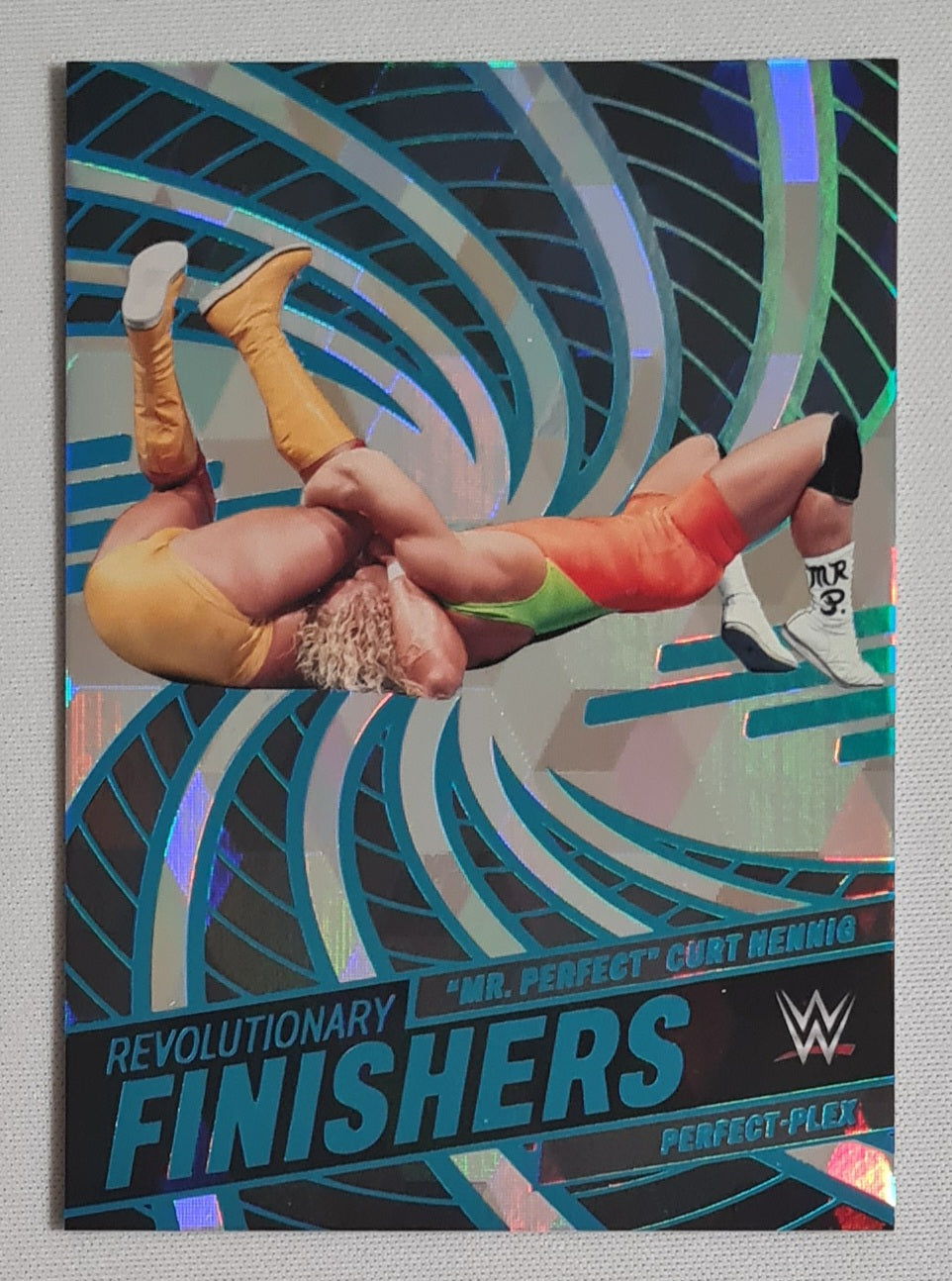 "Mr Perfect" Curt Hennig - 2023 Panini Revolution WWE Finisher #6 /49