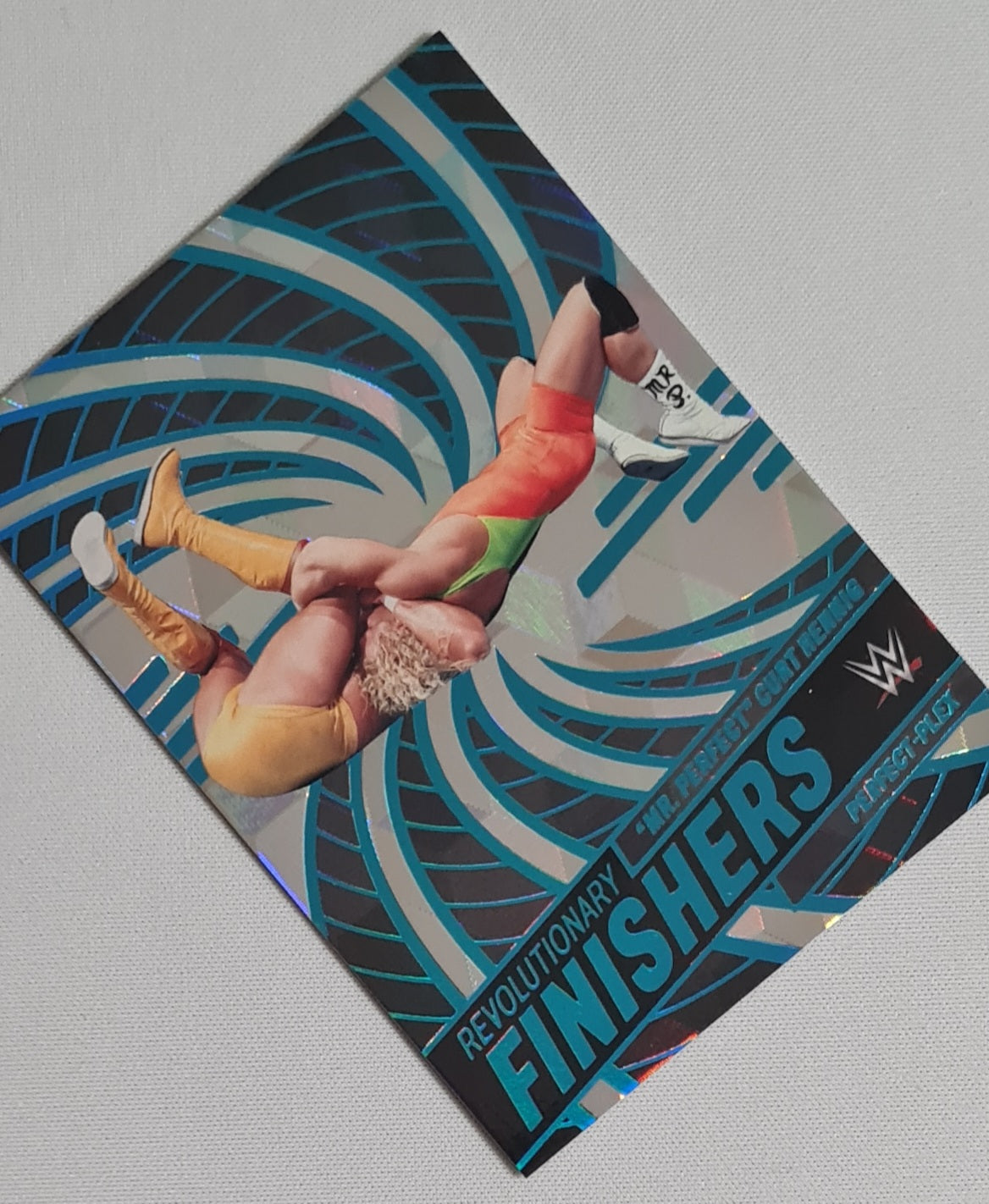 "Mr Perfect" Curt Hennig - 2023 Panini Revolution WWE Finisher #6 /49