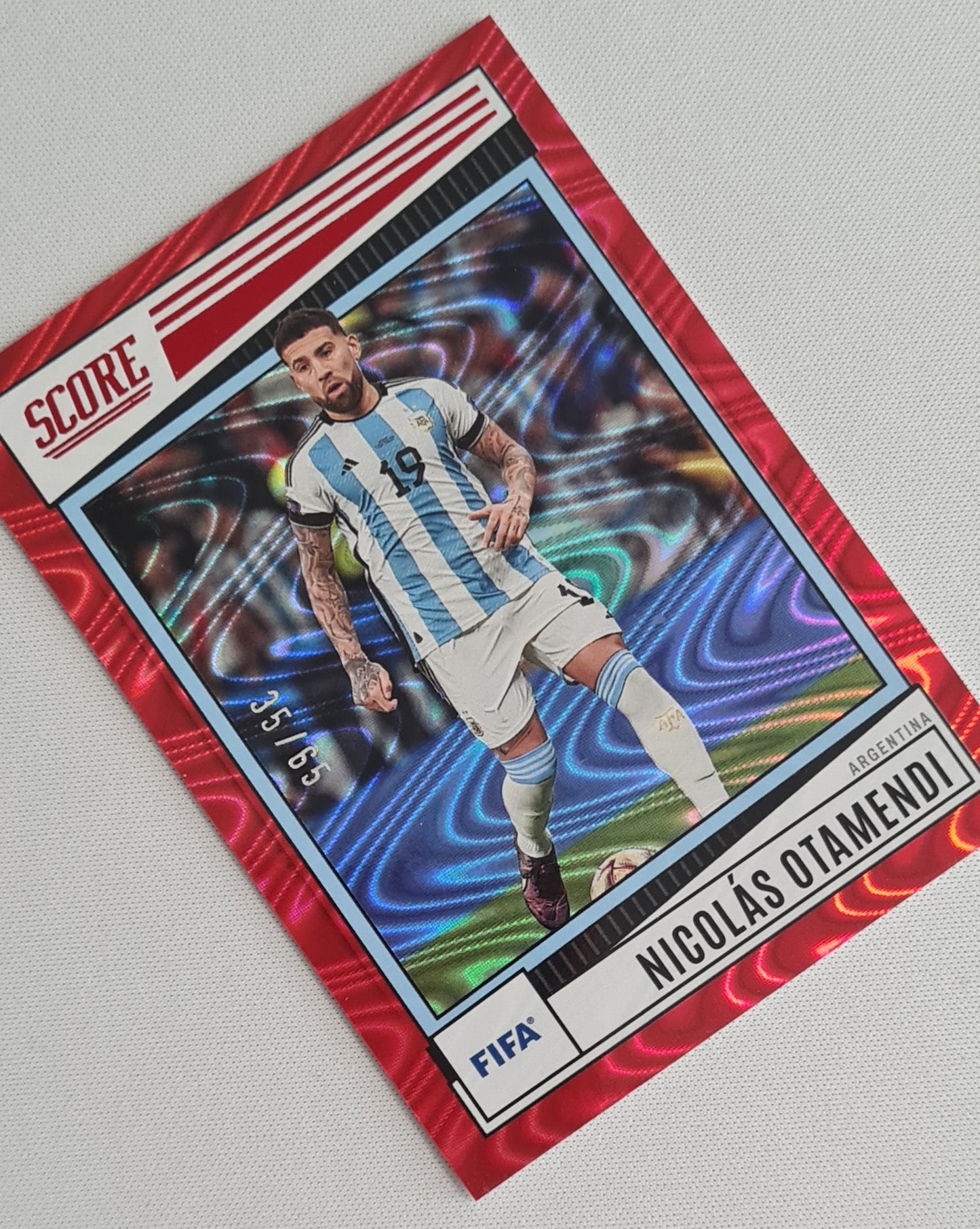 Nicolás Otamendi - 2022-23 Panini FIFA Score Red Swirl /65 #102