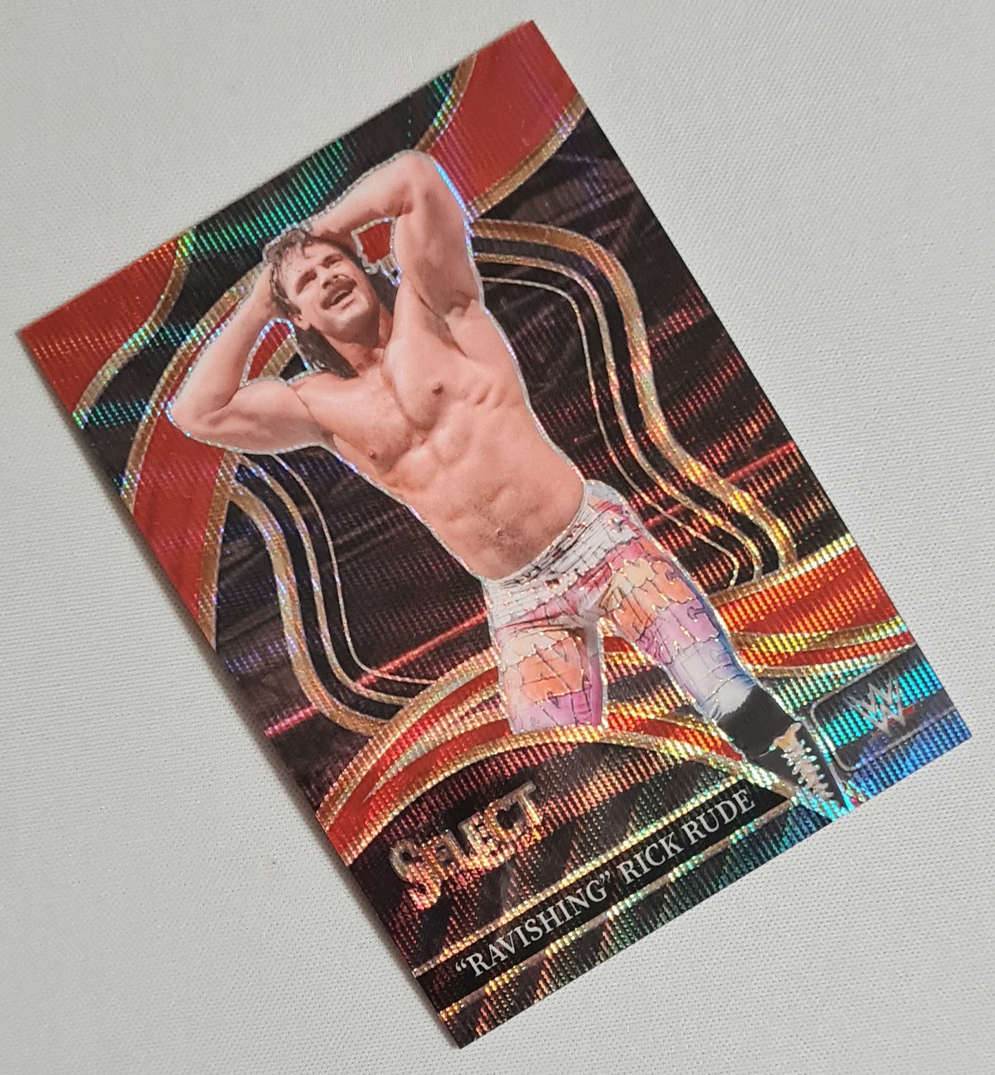 Ravishing Rick Rude - 2024 Panini Select WWE Wrestling Prizm Ringside #299 Red Wave Prizm /99