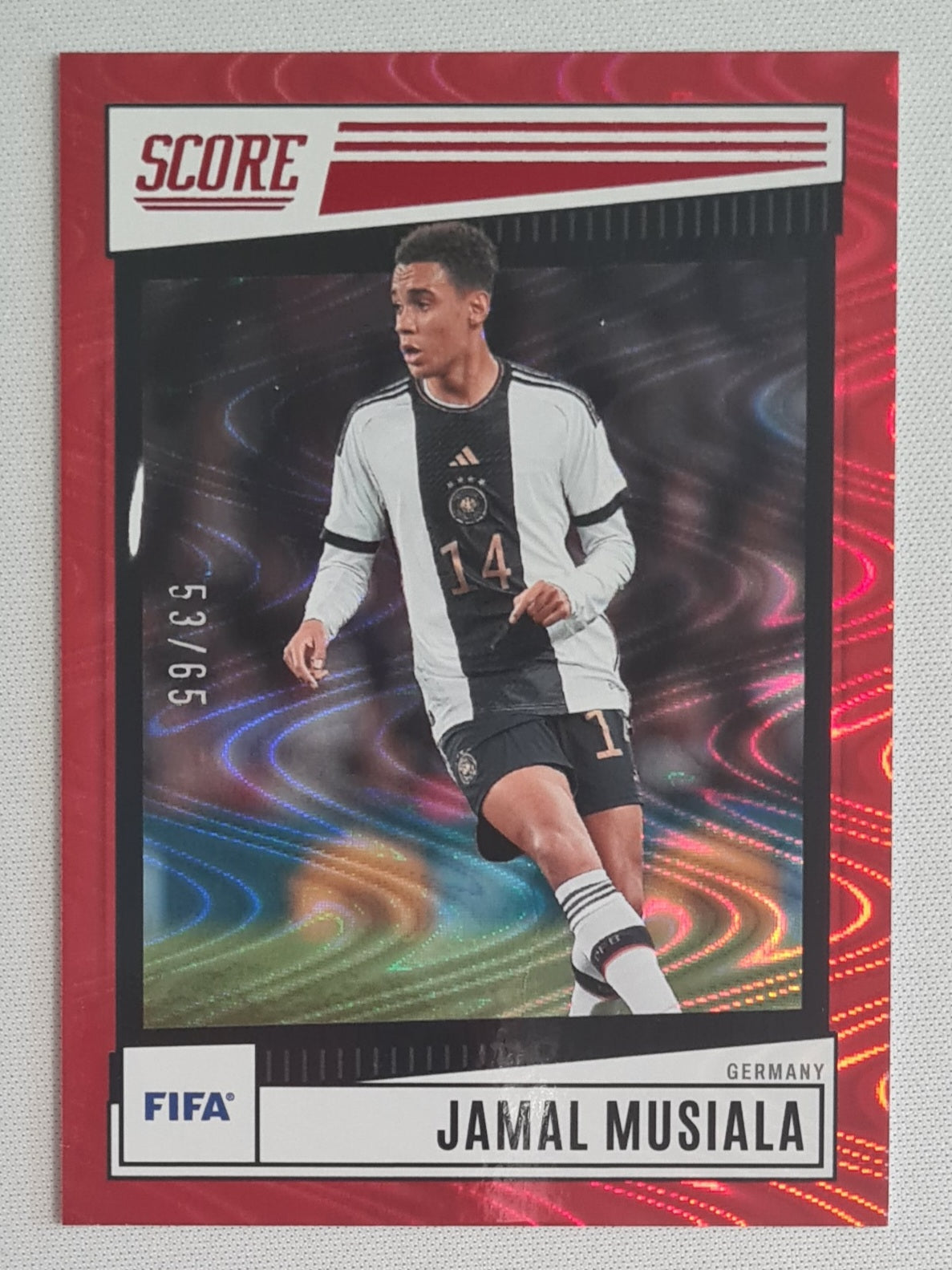 Jamal Musiala - 2022/23 Panini Score FIFA Soccer National Team Germany #84 Red Swirl /65
