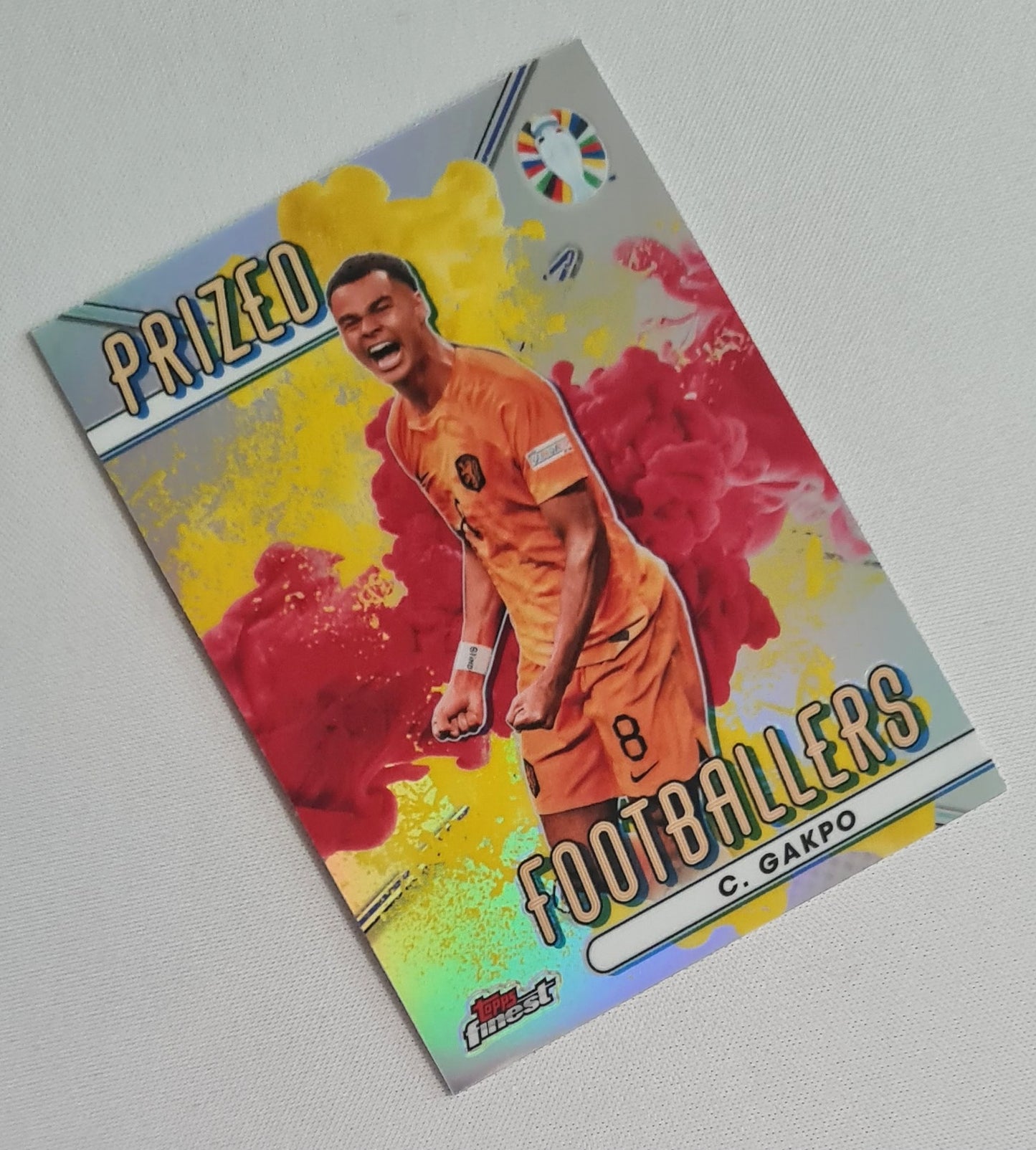Cody Gakpo - 2023 Topps Finest Road to UEFA EURO 2024 National Prized Footballers Fusion Red/Yellow #PFV-CG Team Netherlands KNVB