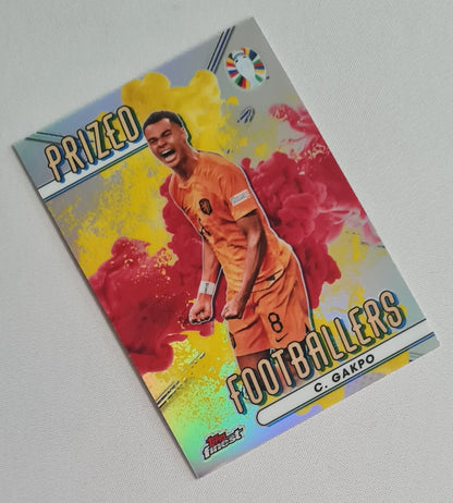 Cody Gakpo - 2023 Topps Finest Road to UEFA EURO 2024 National Prized Footballers Fusion Red/Yellow #PFV-CG Team Netherlands KNVB